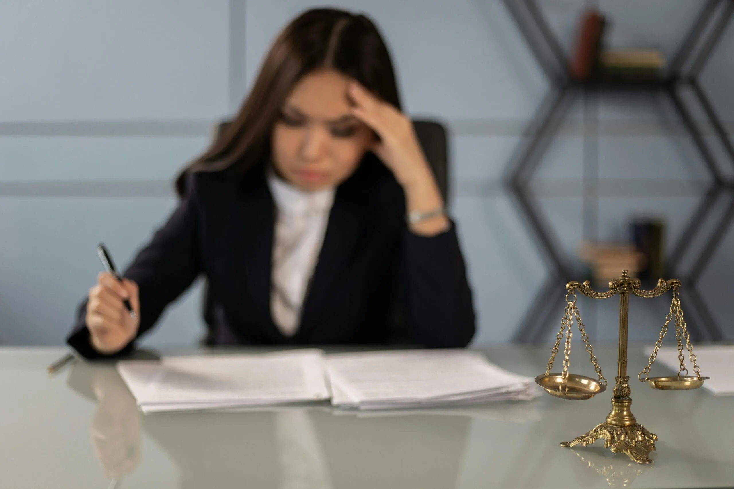 Law firm team reviewing secure digital files provided by professional record retrieval services to support litigation and case preparation.